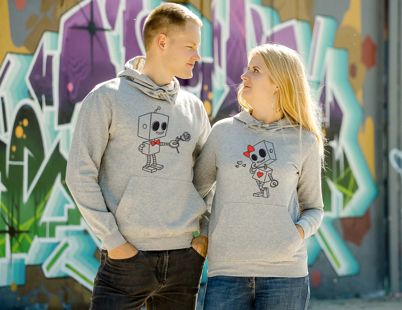 Grey hooded couple jumpers Rose of the robots
